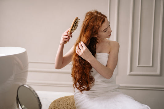 Woman brushing her hair