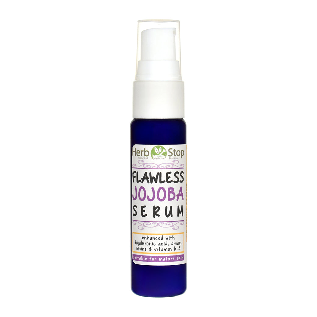 Flawless Jojoba Serum bottle with white cap on a white background