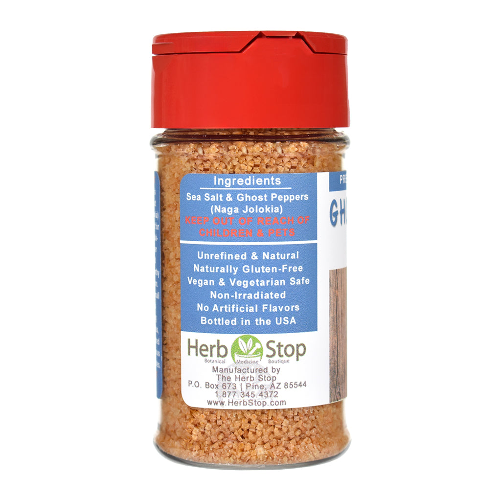 Ghost pepper salt jar with red lid and label on a white background