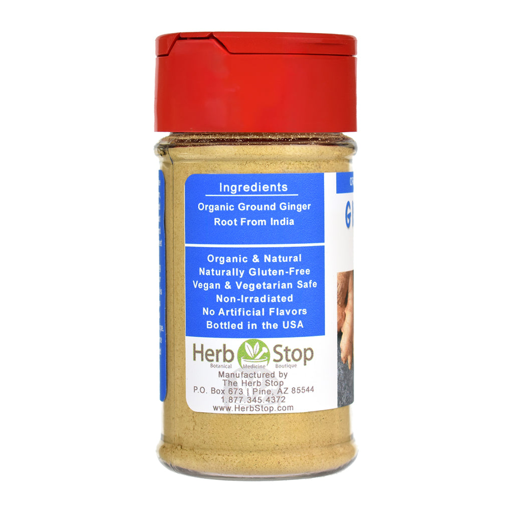 Ginger powder spice jar with red lid and blue label on a white background