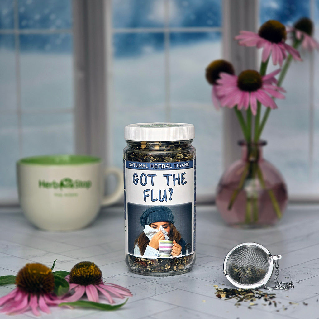 Got The Flu Tea Jar surrounded by echinacea on a snowy day
