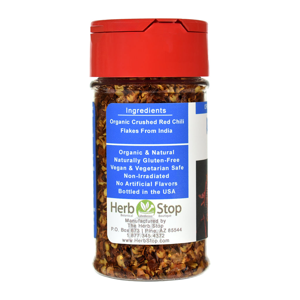 Crushed Red Chili Flakes spice jar with red lid and label on a white background