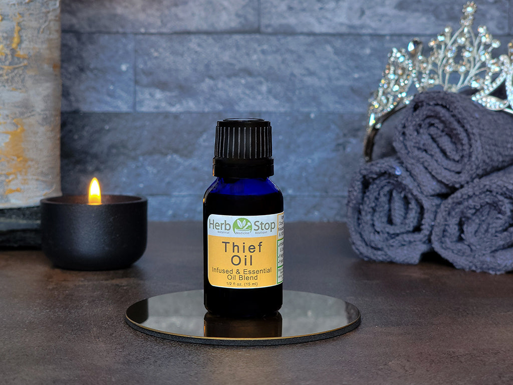 Thief Oil on a mirrored surface with towels