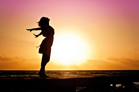 Woman's shadow in the sunlight