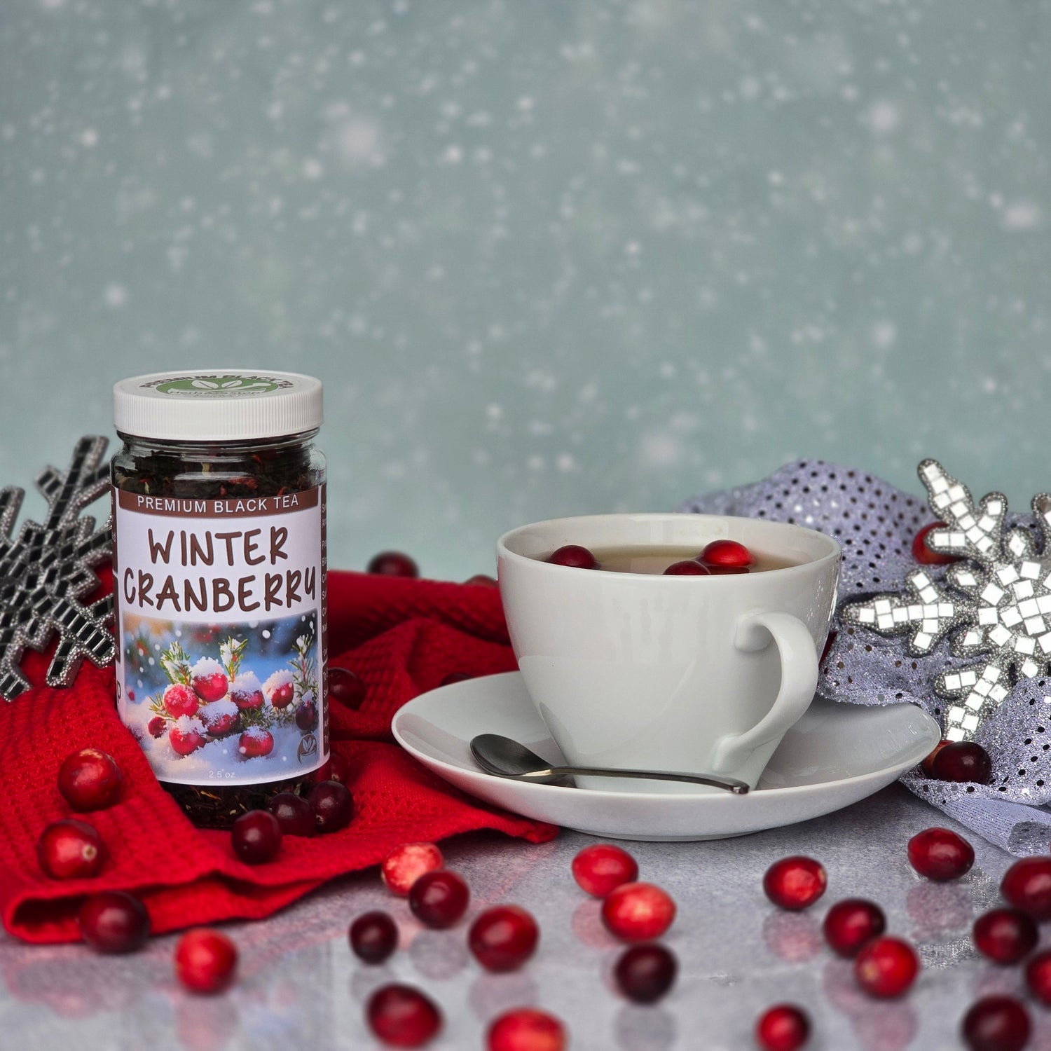 Winter Cranberry black tea with cranberries, white teacup, snowflake decor, and festive winter background