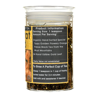 A jar of 24 Karat Gold Black Tea with edible gold leaf tea. Features a black and gold label with product information and brewing instructions.