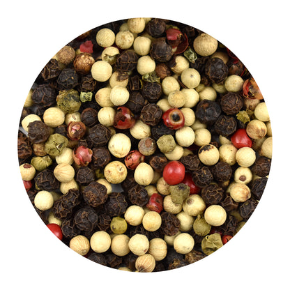 Close up of 4 Pepper Blend of peppercorns on a white background