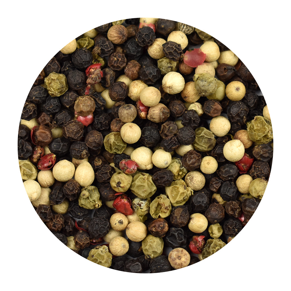 A circular close-up of mixed peppercorns in black, white, green, and pink, centered on a plain white background.