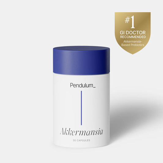 A container of Pendulum Akkermansia capsules with a blue lid on a white background