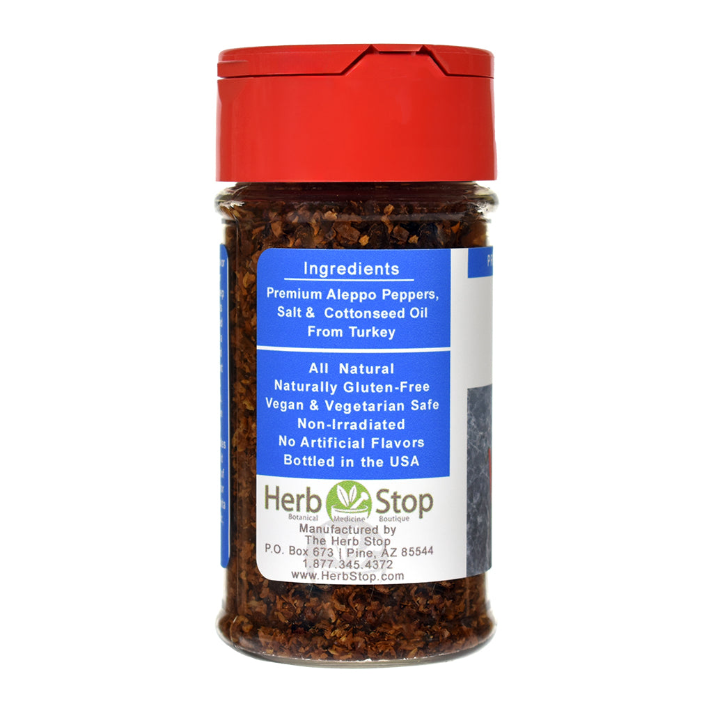 Bottle of Herb Stop Aleppo Pepper with red cap on a white background
