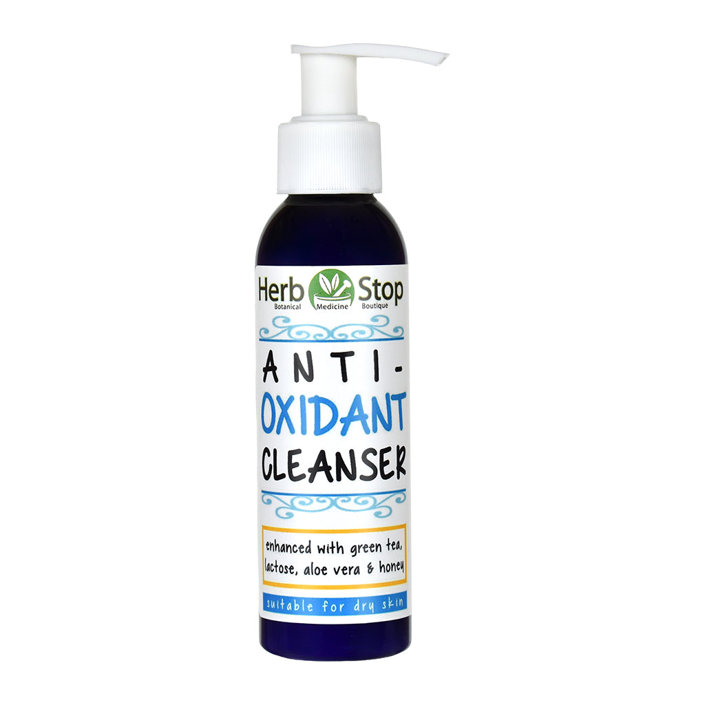 A bottle of Herb Stop Anti-Oxidant Cleanser with a white pump dispenser and a dark blue bottle, shown on a plain white background.