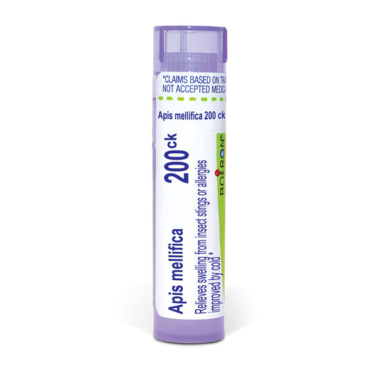 A single tube of Apis mellifica 200ck insect sting or allergy relief pellets, featuring a white label with blue and green text and a light purple cap, set against a plain white background.