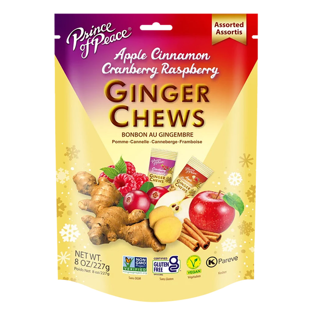A package of Prince Peace Ginger Chews in the Apple Cinnamon and Cranberry Raspberry flavor, featuring a colorful gradient bag with illustrations of ginger, apples, and cranberries on a white background.