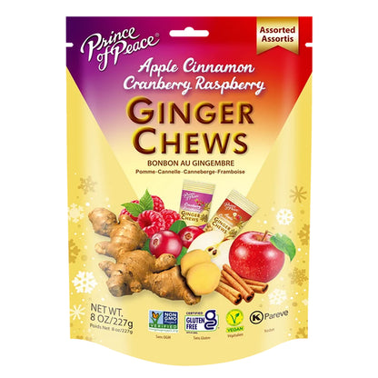 A package of Prince Peace Ginger Chews in the Apple Cinnamon and Cranberry Raspberry flavor, featuring a colorful gradient bag with illustrations of ginger, apples, and cranberries on a white background.