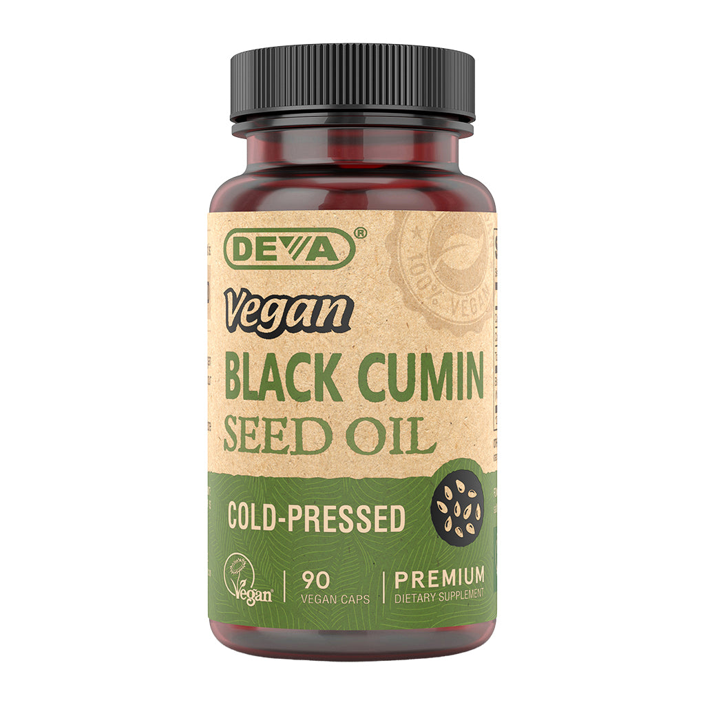 Bottle of Deva Vegan Black Cumin Seed Oil on a white background