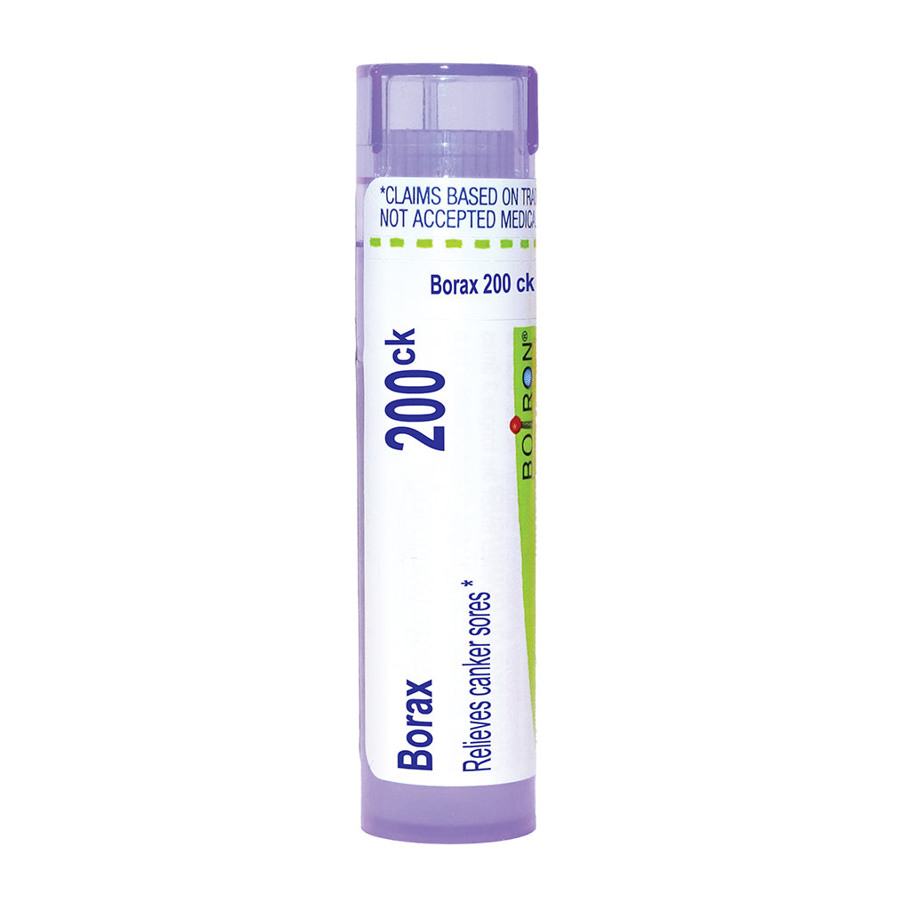 A single tube of Borax 200 ck relief for canker sores, featuring a white label with purple and green accents, set against a plain white background.