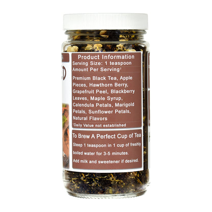 Jar of Buttered Rum Black Tea with a label detailing ingredients and brewing instructions on a white background