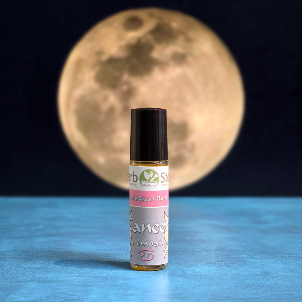 Cancer Aromatherapy Roll-on bottle with the moon in the background and blue surface