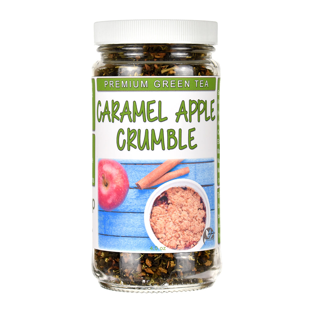Jar of Caramel Apple Crumble premium green tea with a label showing apples, cinnamon, and tea.