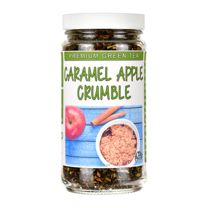 Jar of Caramel Apple Crumble premium green tea with a label showing apples, cinnamon, and tea.