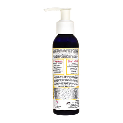 Charcoal Clarity Cleanser bottle with pump and label on a white background