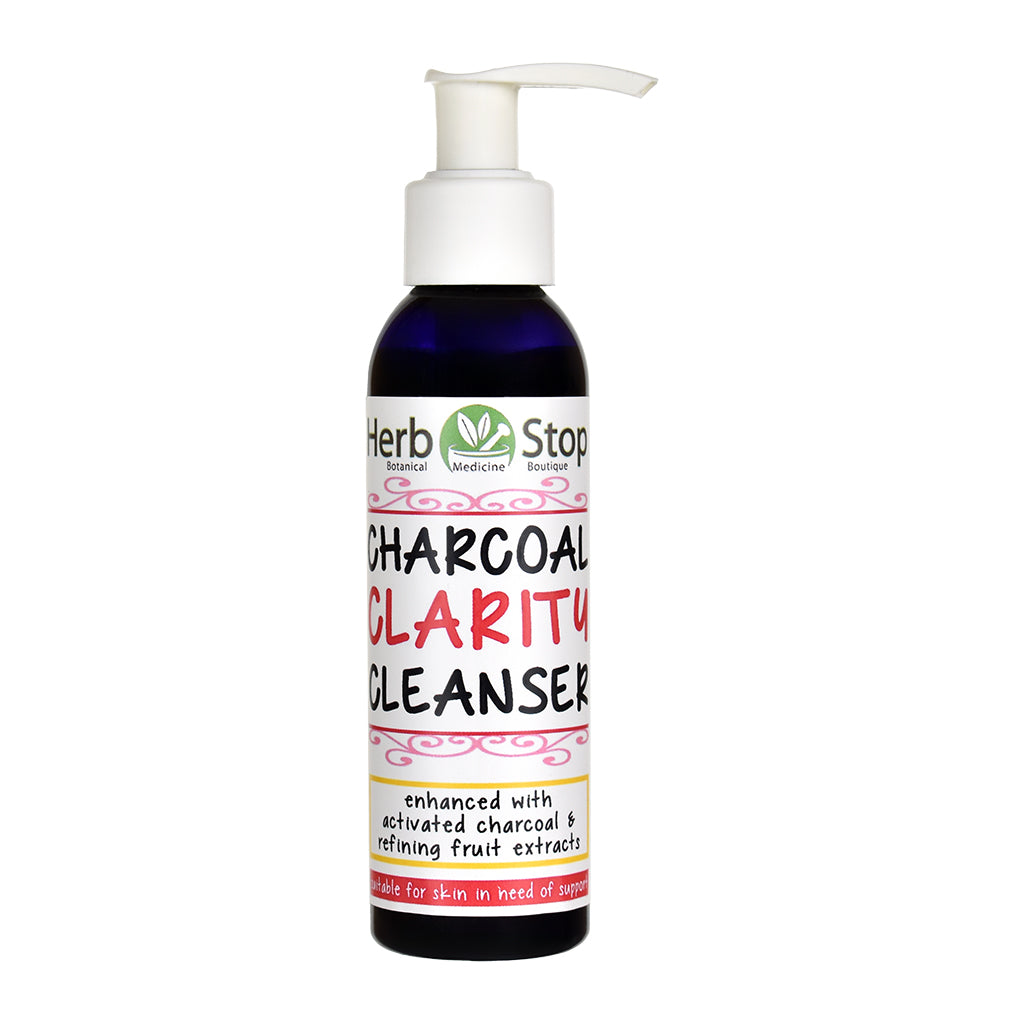 Bottle of Herb Stop Charcoal Clarity Cleanser on a white background