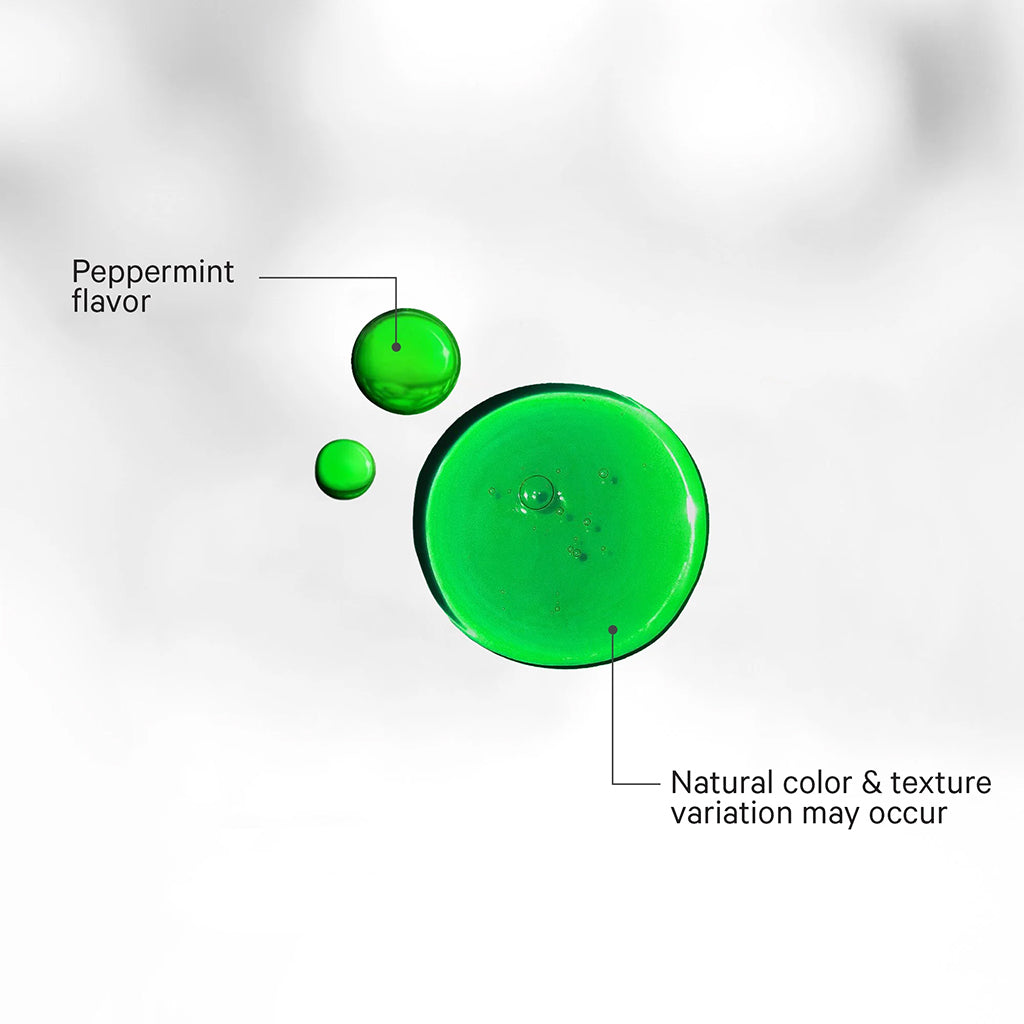 Green liquid droplets with text indicating peppermint flavor and natural variation on a white background