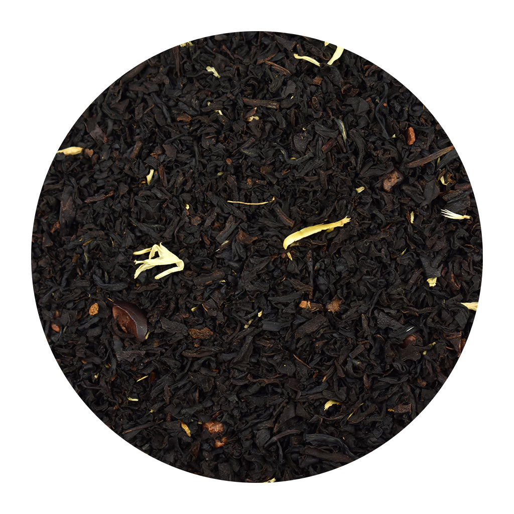 Creme Brulee black tea leaves on a white background