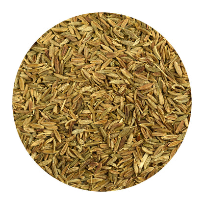 Close-up of organic cumin seeds on a white background
