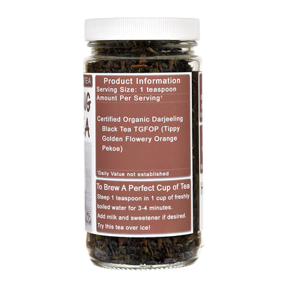 Jar of Darjeeling black tea with a label on a white background