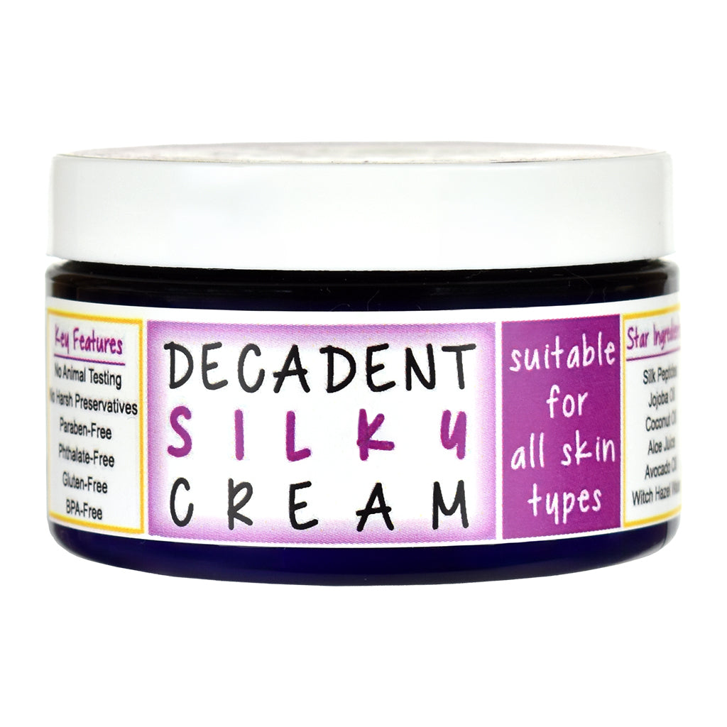 Jar of Decadent Silky Cream on a white background