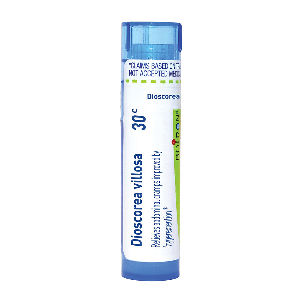 A single tube of Dioscorea villosa 30c by Boiron, featuring a white label with blue and green accents, on a solid white background.