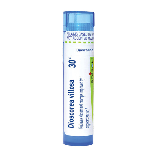 A single tube of Dioscorea villosa 30c by Boiron, featuring a white label with blue and green accents, on a solid white background.