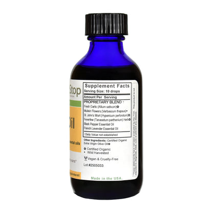 Bottle of Ear Oil with label on a white background