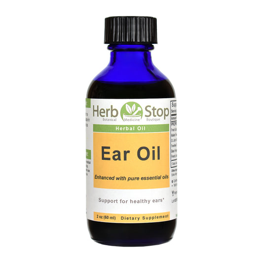 Bottle of Herb Stop Ear Oil on a white background