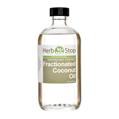 Bottle of Herb Stop Fractionated Coconut Oil on a white background