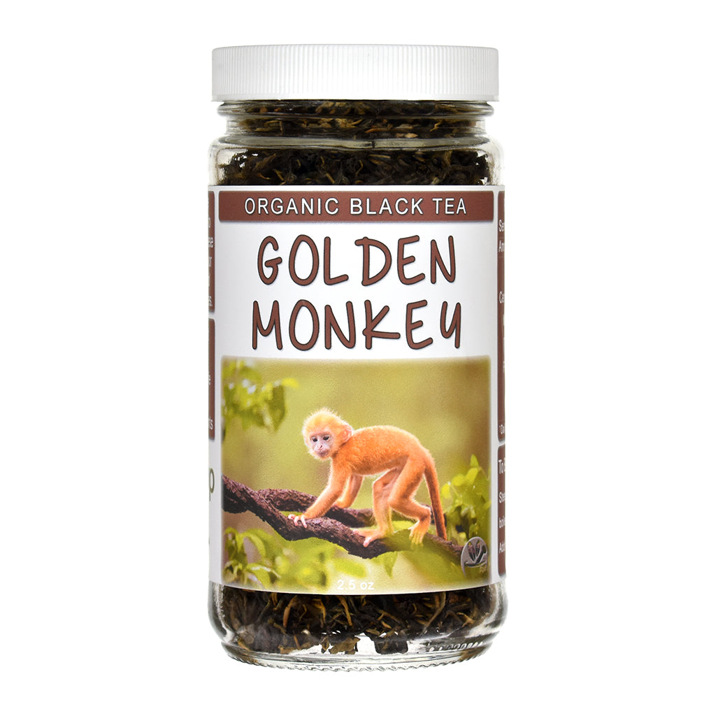 A jar of Golden Monkey Organic Black Tea with a white lid and a white label featuring a golden monkey.