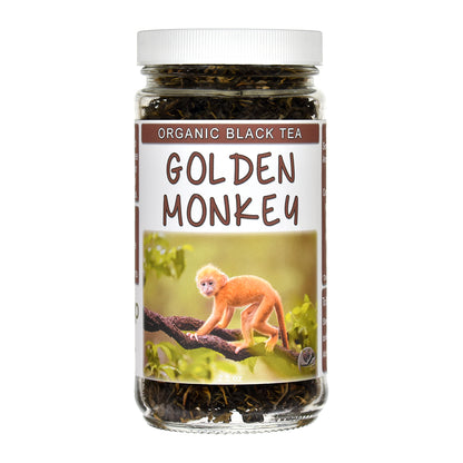 A jar of Golden Monkey Organic Black Tea with a white lid and a white label featuring a golden monkey.
