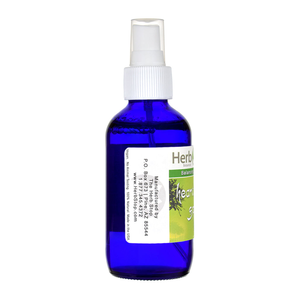 Heart Chakra Aromatherapy spray bottle with a white cap and green label on a white background