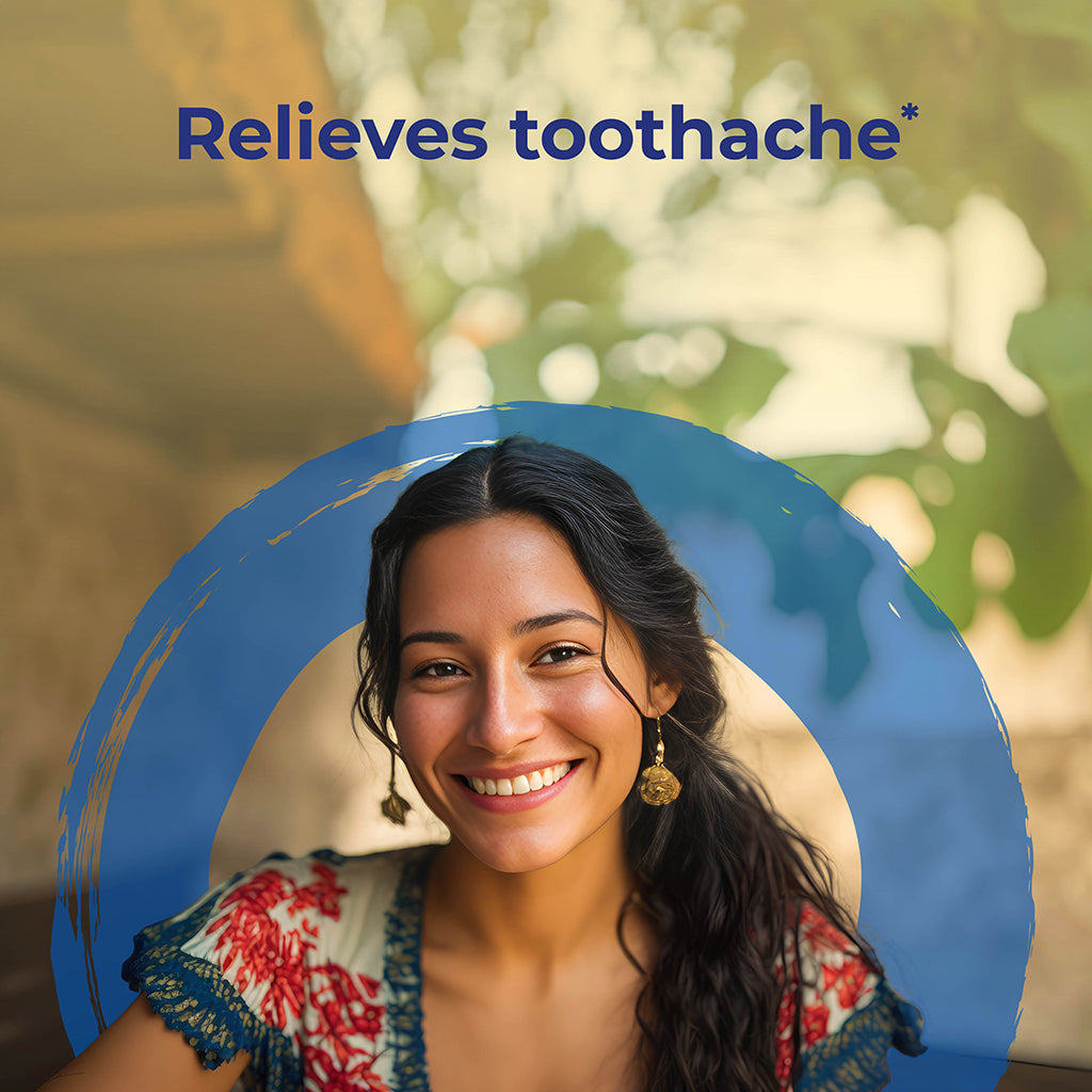 Woman smiling with product relief saying relieves toothache