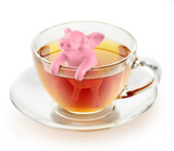 Hot Belly Pig Tea Infuser steeping in a cup