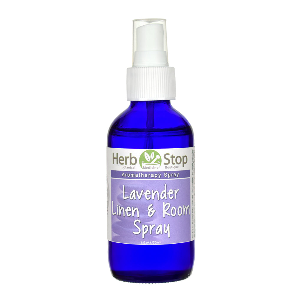Blue spray bottle labeled 'Herb Stop Lavender Linen & Room Spray' on a white background