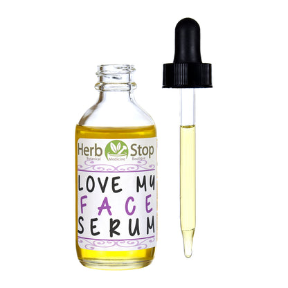 Herb Stop Love My Face Serum bottle with dropper on a white background