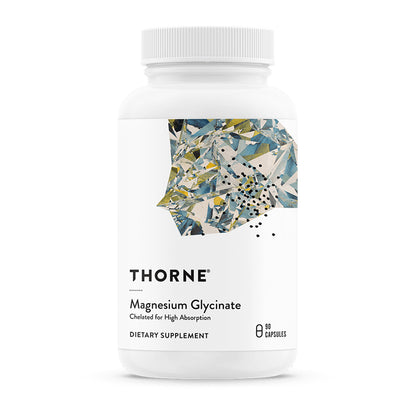 A white bottle of THORNE Magnesium Glycinate dietary supplement with a white cap on a clean white background.