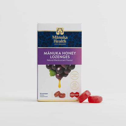 Manuka Health Manuka Honey Lozenges packaging with lozenges on a white background
