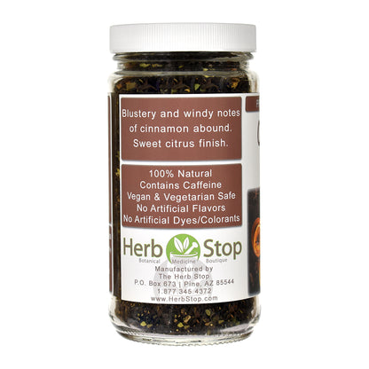 Jar of Orange Spice Black Tea with a label on a white background