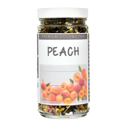 A clear glass jar of Premium Oolong Tea in the flavor Peach, featuring a white lid and a white label with a graphic of fresh peaches.
