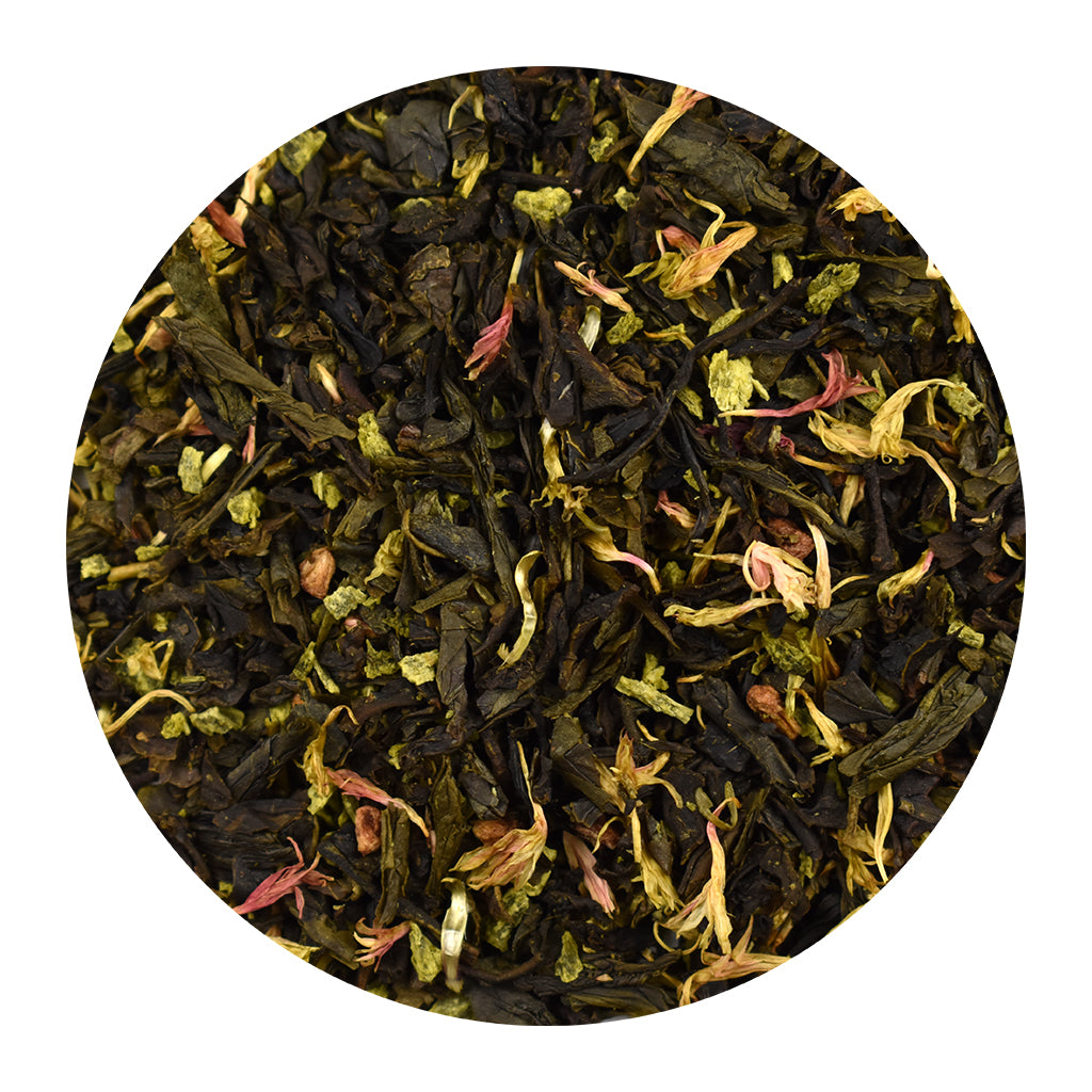 Close-up of Raspberry Coconut green tea leaves on a white background