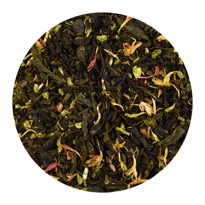 Close-up of Raspberry Coconut green tea leaves on a white background