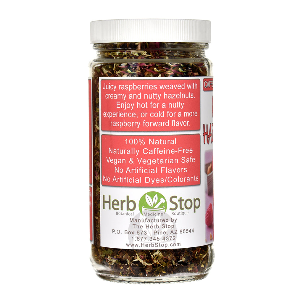 Jar of Raspberry Hazelnut Cream Honeybush tea with a label on a white background